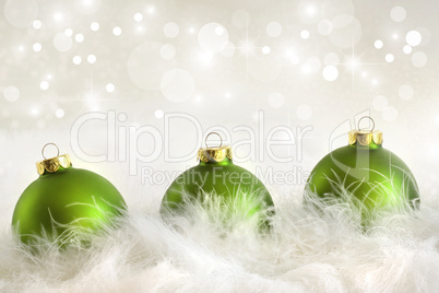 Green christmas balls with holiday background