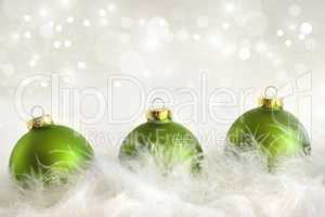 Green christmas balls with holiday background