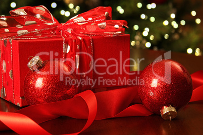 Red christmas gift with ornaments