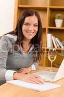 Home office beautiful woman taking notes