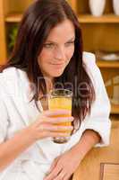 Breakfast - Smiling woman with fresh orange juice