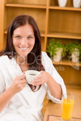 Breakfast - Smiling woman with cup of coffee