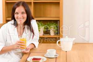 Breakfast home happy woman with orange juice