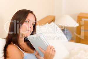 Bedroom thoughtful woman read book in bed