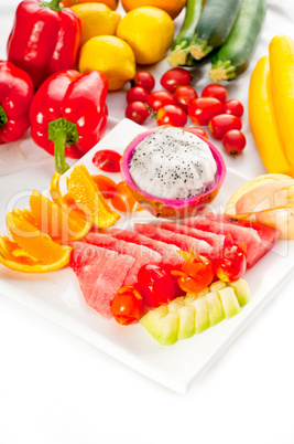 mixed plate of fresh sliced fruits