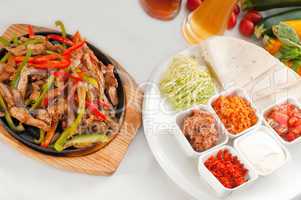 original fajita sizzling hot  on iron plate