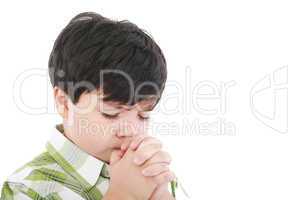 A boys prays earnestly to his creator in heaven