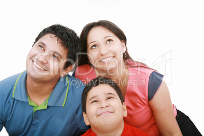 Family surprisingly looking up at copyspace