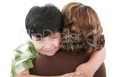 Mother carrying young son looking to camera