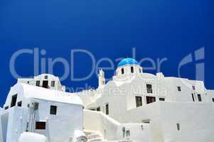 Chapel and white houses in Santorini Island.