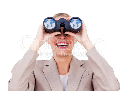 Joyful businesswoman predicting future success through binocular