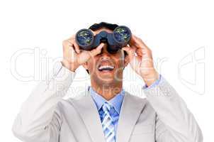 Happy businessman looking through binoculars