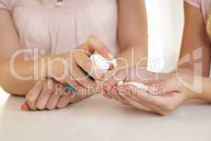 Woman hand applying hand sanitizer