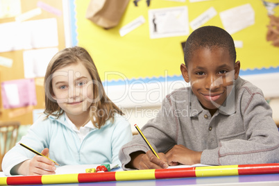 Schoolchildren Studying in classroom
