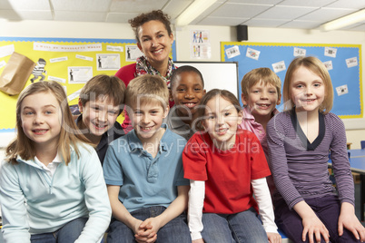 Schoolchildren In classroom with teacher
