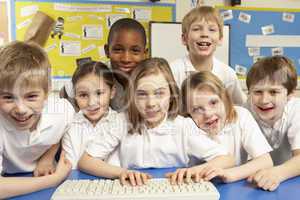 Schoolchildren in IT Class Using Computers