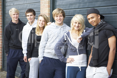 Group Of Teenagers Hanging Out Together Outside