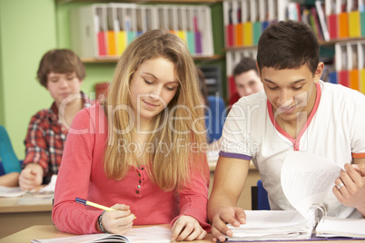 Teenage Students Studying In Classroom