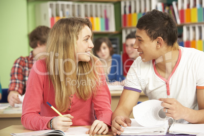 Teenage Students Studying In Classroom