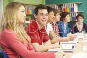 Teenage Students Studying In Classroom