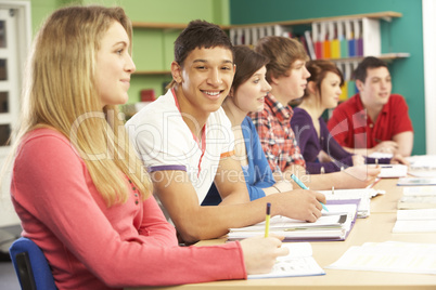 Teenage Students Studying In Classroom