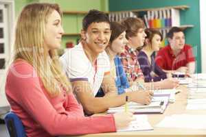 Teenage Students Studying In Classroom