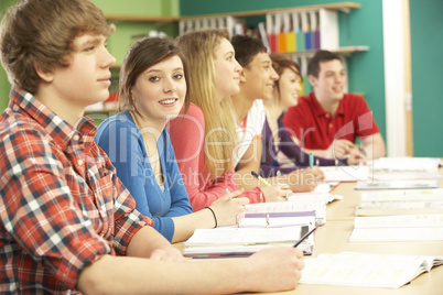 Teenage Students Studying In Classroom