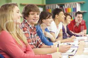 Teenage Students Studying In Classroom