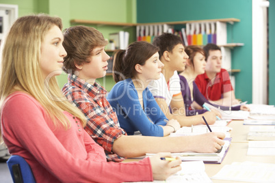 Teenage Students Studying In Classroom