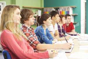 Teenage Students Studying In Classroom