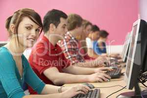 Teenage Students In IT Class Using Computers In Classroom