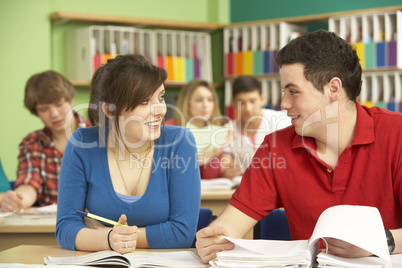 Teenage Students Studying In Classroom