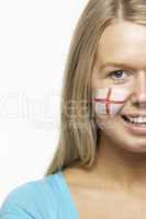 Young Female Sports Fan With St Georges Flag Painted On Face