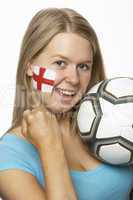 Young Female Football Fan With St Georges Flag Painted On Face