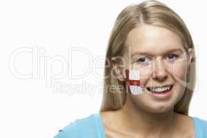 Young Female Sports Fan With St Georges Flag Painted On Face