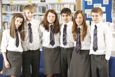 Portrait Of Group Of Teenage Students In Library