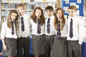 Portrait Of Group Of Teenage Students In Library