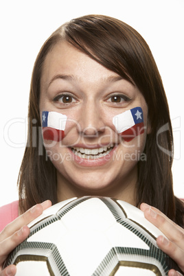 Young Female Football Fan With Chilean Flag Painted On Face