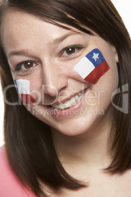 Young Female Sports Fan With Chilean Flag Painted On Face