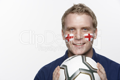 Young Male Football Fan With St Georges Flag Painted On Face