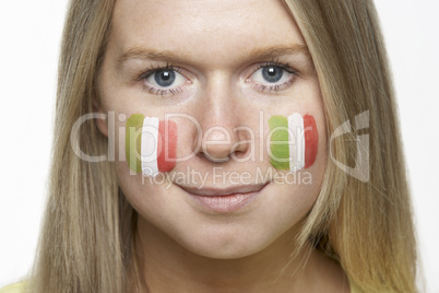 Young Female Sports Fan With Italian Flag Painted On Face
