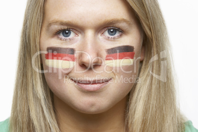 Young Female Sports Fan With German Flag Painted On Face