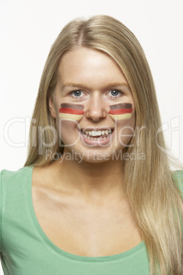 Young Female Sports Fan With German Flag Painted On Face