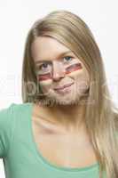 Young Female Sports Fan With German Flag Painted On Face