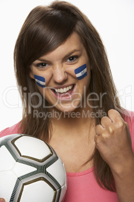 Young Female Football Fan With Honduran Flag Painted On Face