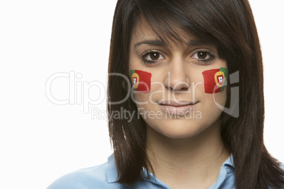 Young Female Sports Fan With Portugese Flag Painted On Face