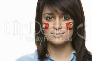 Young Female Sports Fan With Portugese Flag Painted On Face