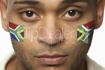 Disappointed Young Male Sports Fan With South African Flag Paint