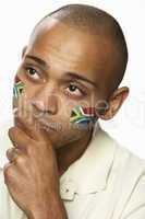 Disappointed Young Male Sports Fan With South African Flag Paint