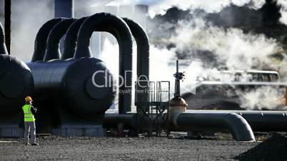 Female Engineer Working at Geothermal Power Station